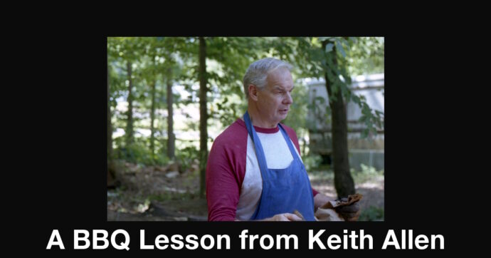 Summary graphic: Keith Allen stands amid green trees wearing a blue apron.