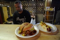 Summary graphic: A pulled pork sandwich and a hot dog on the counter at Payne’s Payne’s Bar-B-Que