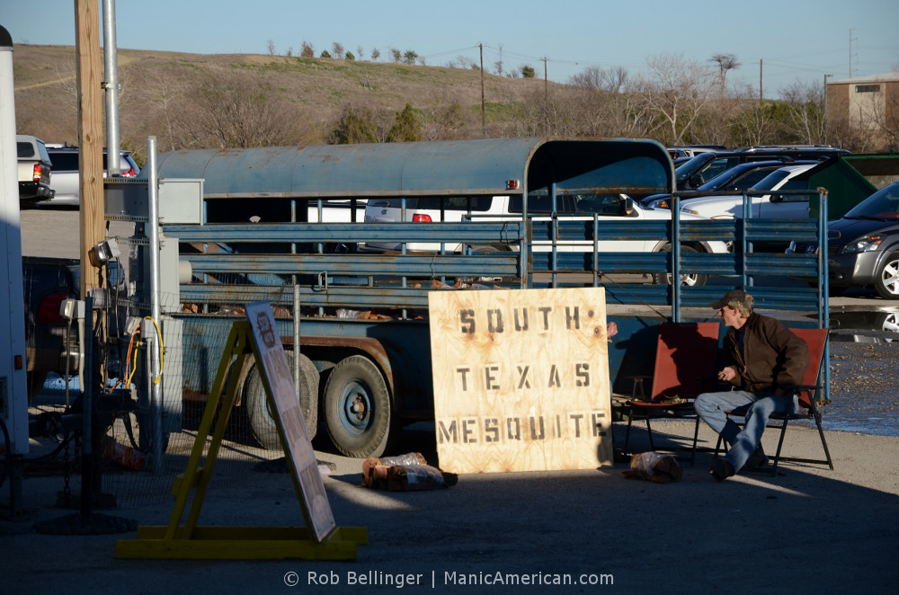 A man selling wood.