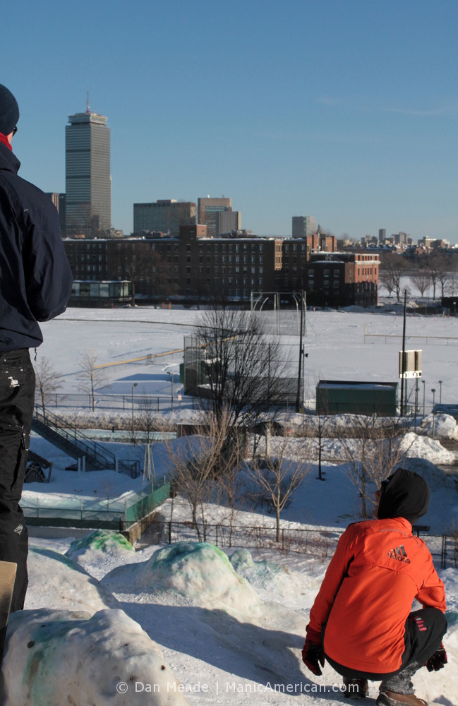 Two climbers look out at the Pru.