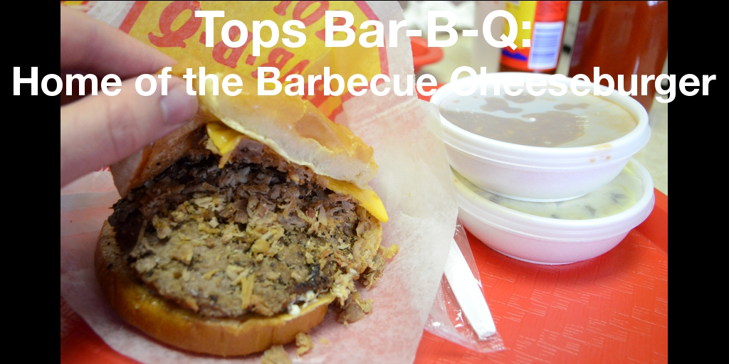 Summary graphic: A cheeseburger with barbecue pork atop it, next to two small dishes of sides.