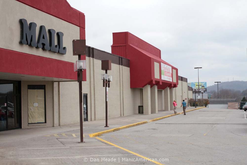 The exterior and parking lot of a windowless mall