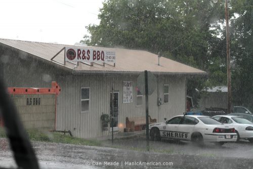 The exterior of R&S in a rainstorm.