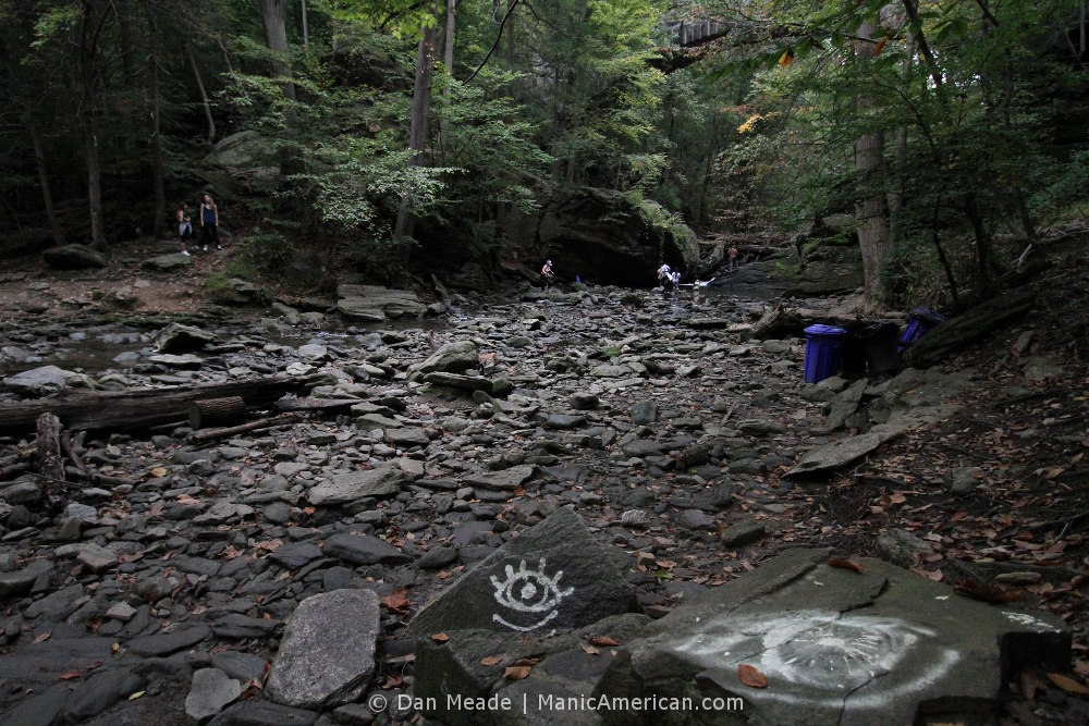 Illuminati graffiti on rocks