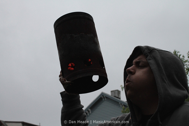 A chimney is stoked by blowing into it.