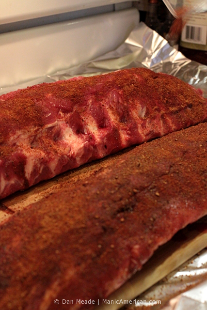 Raw ribs are seasoned.