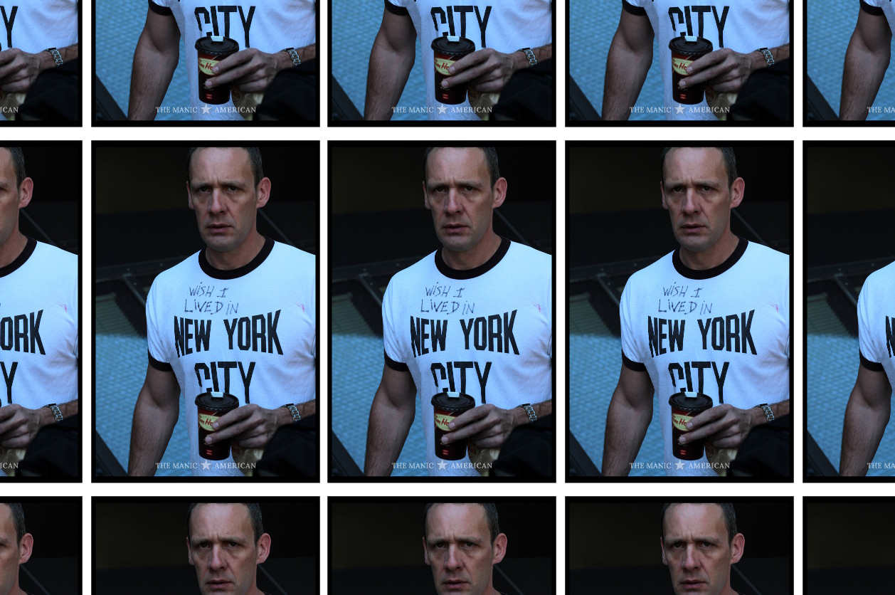 A cropped grid of 15 repeated photos. The photo is of a man walking and looking toward the camera in a white t-shirt that originally read, “NEW YORK CITY” until someone wrote on it. The shirt now reads, “WISH I LIVED IN NEW YORK CITY.”
